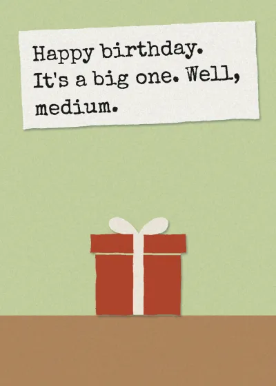 A birthday card with a wrapped present on the front