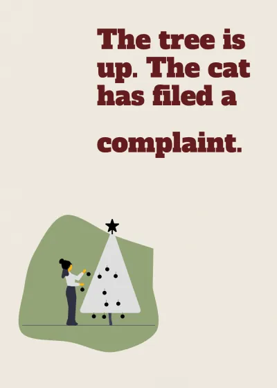 Decorating the tree. The tree is up. The cat has filed a formal complaint.